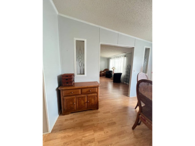 MOTIVATED SELLER! Tucked away in a peaceful Winter Haven 55+ on Lake Henry Golf Club in Florida - for sale on GolfHomes.com, golf home, golf lot