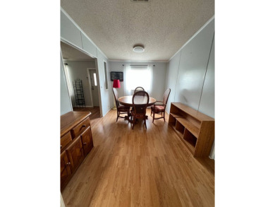 MOTIVATED SELLER! Tucked away in a peaceful Winter Haven 55+ on Lake Henry Golf Club in Florida - for sale on GolfHomes.com, golf home, golf lot