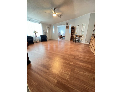 MOTIVATED SELLER! Tucked away in a peaceful Winter Haven 55+ on Lake Henry Golf Club in Florida - for sale on GolfHomes.com, golf home, golf lot
