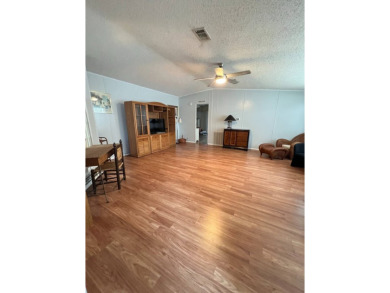 MOTIVATED SELLER! Tucked away in a peaceful Winter Haven 55+ on Lake Henry Golf Club in Florida - for sale on GolfHomes.com, golf home, golf lot