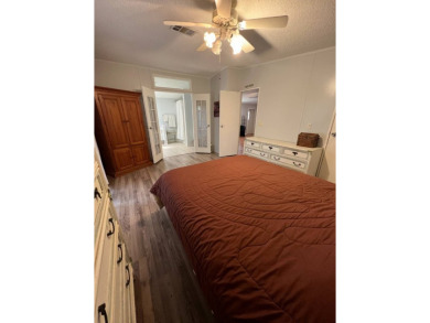 MOTIVATED SELLER! Tucked away in a peaceful Winter Haven 55+ on Lake Henry Golf Club in Florida - for sale on GolfHomes.com, golf home, golf lot