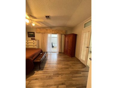 MOTIVATED SELLER! Tucked away in a peaceful Winter Haven 55+ on Lake Henry Golf Club in Florida - for sale on GolfHomes.com, golf home, golf lot