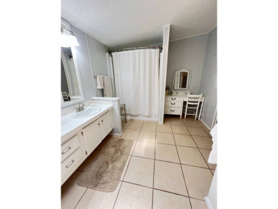 MOTIVATED SELLER! Tucked away in a peaceful Winter Haven 55+ on Lake Henry Golf Club in Florida - for sale on GolfHomes.com, golf home, golf lot