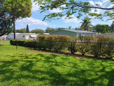 OWN YOUR LAND in this 55+ active community. This updated and on Heritage Ridge Golf Club in Florida - for sale on GolfHomes.com, golf home, golf lot