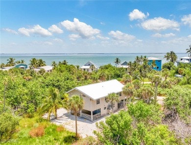 Authentic Old Florida Island Charm and timeless appeal combine on Captiva Island Golf Club in Florida - for sale on GolfHomes.com, golf home, golf lot