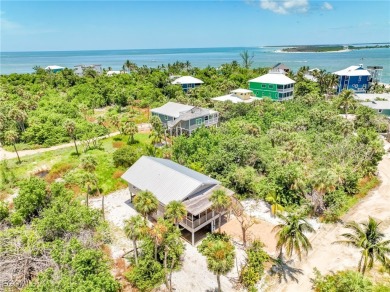 Authentic Old Florida Island Charm and timeless appeal combine on Captiva Island Golf Club in Florida - for sale on GolfHomes.com, golf home, golf lot
