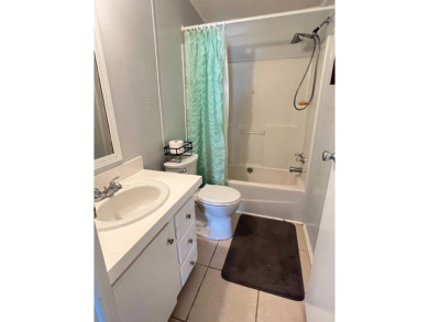 MOTIVATED SELLER! Tucked away in a peaceful Winter Haven 55+ on Lake Henry Golf Club in Florida - for sale on GolfHomes.com, golf home, golf lot