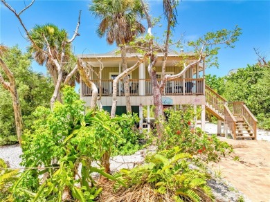 Authentic Old Florida Island Charm and timeless appeal combine on Captiva Island Golf Club in Florida - for sale on GolfHomes.com, golf home, golf lot