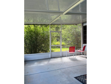 MOTIVATED SELLER! Tucked away in a peaceful Winter Haven 55+ on Lake Henry Golf Club in Florida - for sale on GolfHomes.com, golf home, golf lot