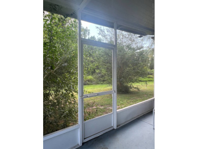 MOTIVATED SELLER! Tucked away in a peaceful Winter Haven 55+ on Lake Henry Golf Club in Florida - for sale on GolfHomes.com, golf home, golf lot