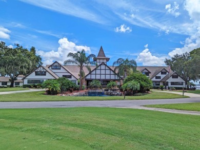 MOTIVATED SELLER! Tucked away in a peaceful Winter Haven 55+ on Lake Henry Golf Club in Florida - for sale on GolfHomes.com, golf home, golf lot