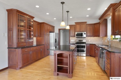 Welcome to this elegant 4 bed, 5 bath walkout ranch home located on Wilderness Ridge Golf Club in Nebraska - for sale on GolfHomes.com, golf home, golf lot