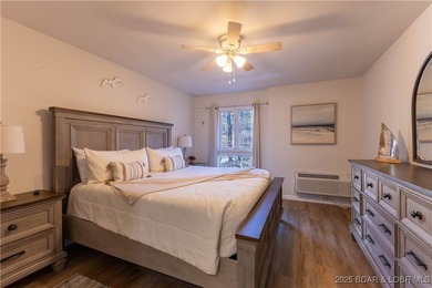 Discover lake living at its finest in the iconic Tan-Tar-A on The Oaks Golf Course in Missouri - for sale on GolfHomes.com, golf home, golf lot