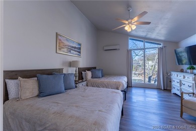 Discover lake living at its finest in the iconic Tan-Tar-A on The Oaks Golf Course in Missouri - for sale on GolfHomes.com, golf home, golf lot