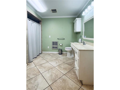 This 4 bedroom, 3 bath ranch has perfect bones and a great floor on Cherokee Golf and Country Club in Georgia - for sale on GolfHomes.com, golf home, golf lot