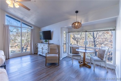 Discover lake living at its finest in the iconic Tan-Tar-A on The Oaks Golf Course in Missouri - for sale on GolfHomes.com, golf home, golf lot