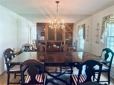 This 4 bedroom, 3 bath ranch has perfect bones and a great floor on Cherokee Golf and Country Club in Georgia - for sale on GolfHomes.com, golf home, golf lot