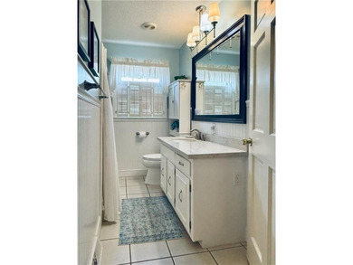 This 4 bedroom, 3 bath ranch has perfect bones and a great floor on Cherokee Golf and Country Club in Georgia - for sale on GolfHomes.com, golf home, golf lot