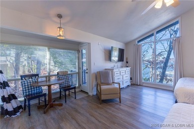 Discover lake living at its finest in the iconic Tan-Tar-A on The Oaks Golf Course in Missouri - for sale on GolfHomes.com, golf home, golf lot