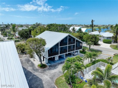 Discover modern coastal luxury at 982 Sand Castle Road, a fully on The Dunes Golf and Tennis Club in Florida - for sale on GolfHomes.com, golf home, golf lot