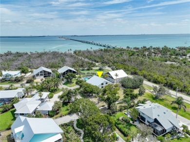 Discover modern coastal luxury at 982 Sand Castle Road, a fully on The Dunes Golf and Tennis Club in Florida - for sale on GolfHomes.com, golf home, golf lot