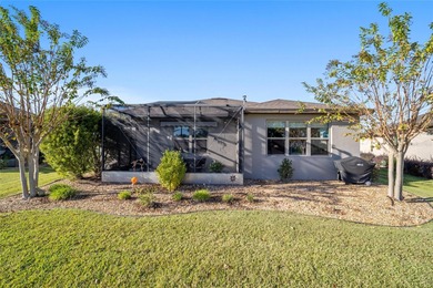 Step into a world of refined comfort and natural beauty in this on Stone Creek Golf Club in Florida - for sale on GolfHomes.com, golf home, golf lot