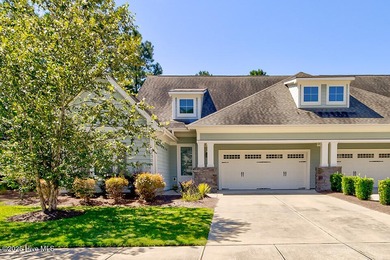 Beautifully updated townhouse tucked away in a peaceful on Cape Fear National At Brunswick Forest in North Carolina - for sale on GolfHomes.com, golf home, golf lot