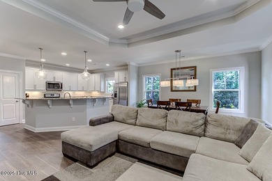 Beautifully updated townhouse tucked away in a peaceful on Cape Fear National At Brunswick Forest in North Carolina - for sale on GolfHomes.com, golf home, golf lot