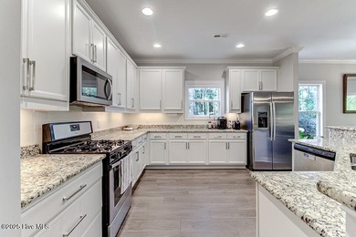 Beautifully updated townhouse tucked away in a peaceful on Cape Fear National At Brunswick Forest in North Carolina - for sale on GolfHomes.com, golf home, golf lot