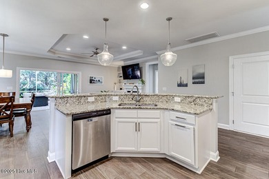 Beautifully updated townhouse tucked away in a peaceful on Cape Fear National At Brunswick Forest in North Carolina - for sale on GolfHomes.com, golf home, golf lot