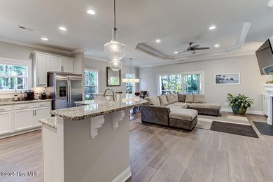 Beautifully updated townhouse tucked away in a peaceful on Cape Fear National At Brunswick Forest in North Carolina - for sale on GolfHomes.com, golf home, golf lot