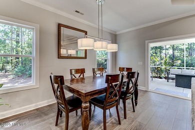 Beautifully updated townhouse tucked away in a peaceful on Cape Fear National At Brunswick Forest in North Carolina - for sale on GolfHomes.com, golf home, golf lot