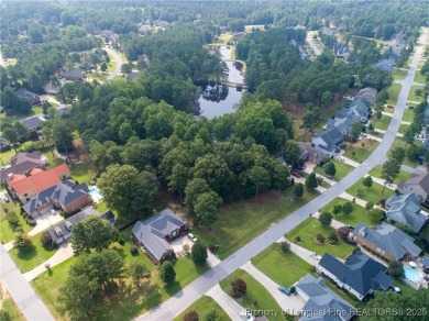 Beautiful lot with a water view located in the prestigious on Anderson Creek Golf Club in North Carolina - for sale on GolfHomes.com, golf home, golf lot