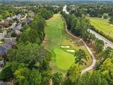 Located in the desirable Overlook at Marietta Country Club on Marietta Country Club in Georgia - for sale on GolfHomes.com, golf home, golf lot