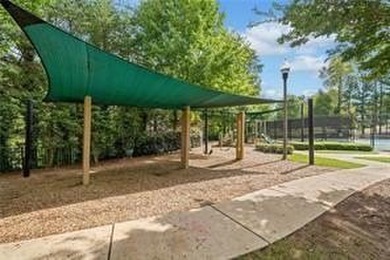 Located in the desirable Overlook at Marietta Country Club on Marietta Country Club in Georgia - for sale on GolfHomes.com, golf home, golf lot