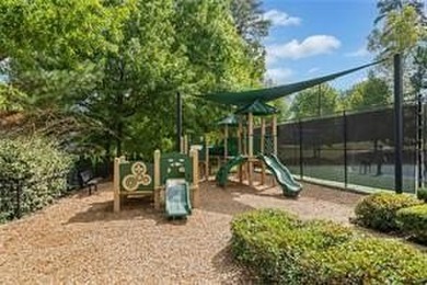 Located in the desirable Overlook at Marietta Country Club on Marietta Country Club in Georgia - for sale on GolfHomes.com, golf home, golf lot