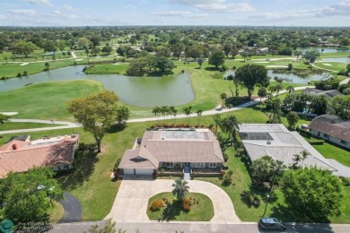 SPECTACULAR 1/2 ACRE SINGLE STORY HOME LOCATED ON THE 9TH HOLE on Country Club of Coral Springs in Florida - for sale on GolfHomes.com, golf home, golf lot