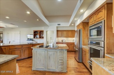 An executive home on golf course with fabulous mountain views on Rio Verde Country Club - Quail Run in Arizona - for sale on GolfHomes.com, golf home, golf lot