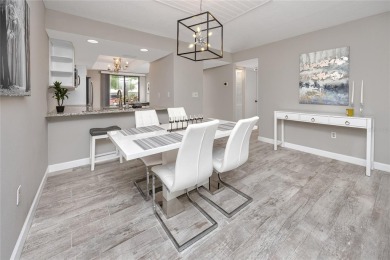 Stunning Waterview Condo in the Gated Community of East Lake on East Lake Woodlands Country Club in Florida - for sale on GolfHomes.com, golf home, golf lot