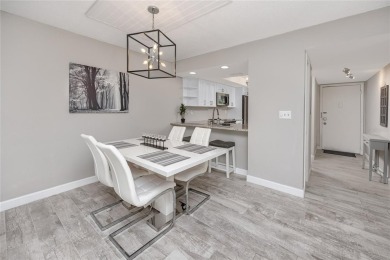 Stunning Waterview Condo in the Gated Community of East Lake on East Lake Woodlands Country Club in Florida - for sale on GolfHomes.com, golf home, golf lot