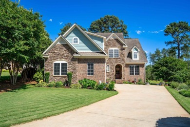 Nestled in the sought-after Woodfin Ridge Golf Course community on Woodfin Ridge Golf Club in South Carolina - for sale on GolfHomes.com, golf home, golf lot