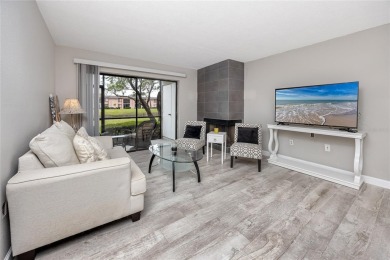 Stunning Waterview Condo in the Gated Community of East Lake on East Lake Woodlands Country Club in Florida - for sale on GolfHomes.com, golf home, golf lot