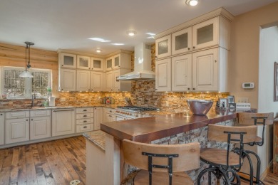 This residence is conveniently situated near all of Angel Fire on Angel Fire Resort Country Club in New Mexico - for sale on GolfHomes.com, golf home, golf lot