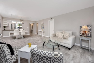 Stunning Waterview Condo in the Gated Community of East Lake on East Lake Woodlands Country Club in Florida - for sale on GolfHomes.com, golf home, golf lot
