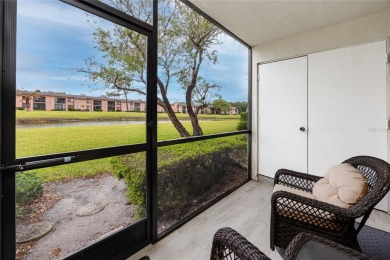 Stunning Waterview Condo in the Gated Community of East Lake on East Lake Woodlands Country Club in Florida - for sale on GolfHomes.com, golf home, golf lot