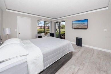 Stunning Waterview Condo in the Gated Community of East Lake on East Lake Woodlands Country Club in Florida - for sale on GolfHomes.com, golf home, golf lot