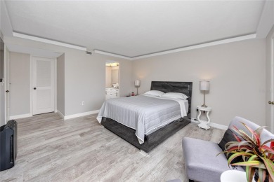 Stunning Waterview Condo in the Gated Community of East Lake on East Lake Woodlands Country Club in Florida - for sale on GolfHomes.com, golf home, golf lot