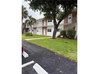 Beautifully maintained 2-bedroom, 1-bath first-floor condo with on Leisureville Community Association in Florida - for sale on GolfHomes.com, golf home, golf lot