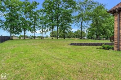 Stunning updated executive home with sunroom and screened porch on Sage Meadows Golf Course in Arkansas - for sale on GolfHomes.com, golf home, golf lot