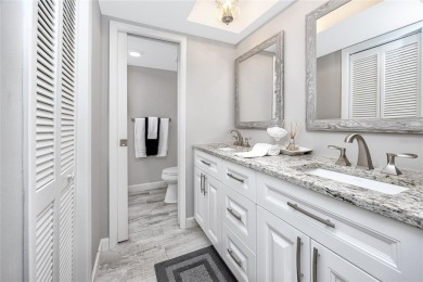Stunning Waterview Condo in the Gated Community of East Lake on East Lake Woodlands Country Club in Florida - for sale on GolfHomes.com, golf home, golf lot